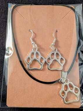 Hand Crafted Silver Paw Print Earrings with Black Cord Accent